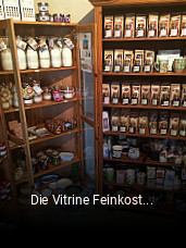 Die Vitrine Feinkost, Tee, Destillerie online reservieren