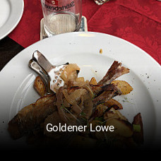 Goldener Lowe tisch buchen