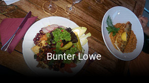 Bunter Lowe online reservieren